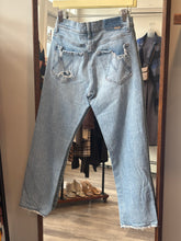Load image into Gallery viewer, Mother Light Wash Distressed Jeans

