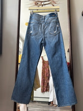 Load image into Gallery viewer, Mother Light Wash Distressed Denim
