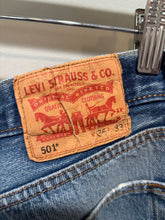 Load image into Gallery viewer, Vintage Levis 501 Light Wash Distressed Jeans
