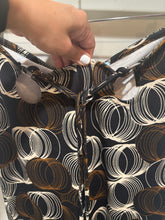 Load image into Gallery viewer, Urban Outfitters Brown Pattern Pants.

